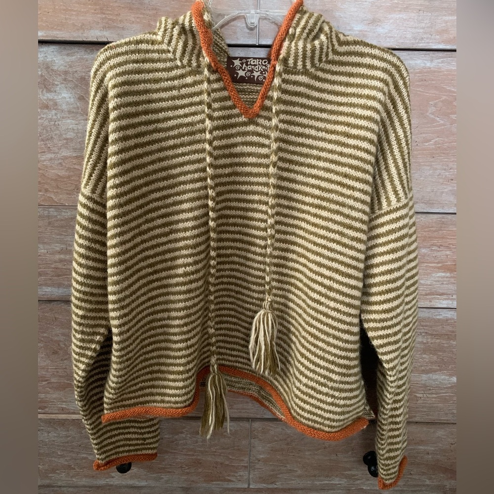 Tara Handknits pull over sweater with hood.